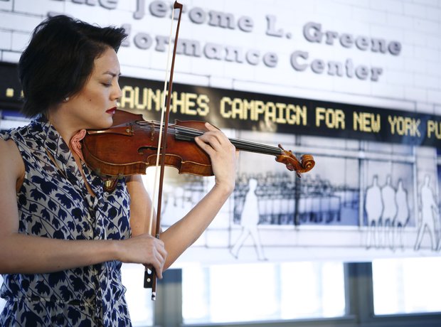 Anne Akiko Meyers playing violin