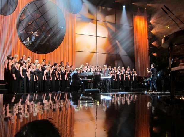 Gary Barlow rehearsing with the Military Wives for