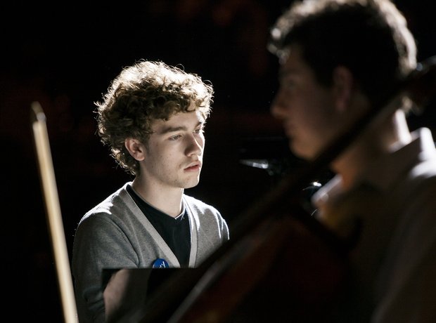 The Jocelyn Trio prepare for their performance in 
