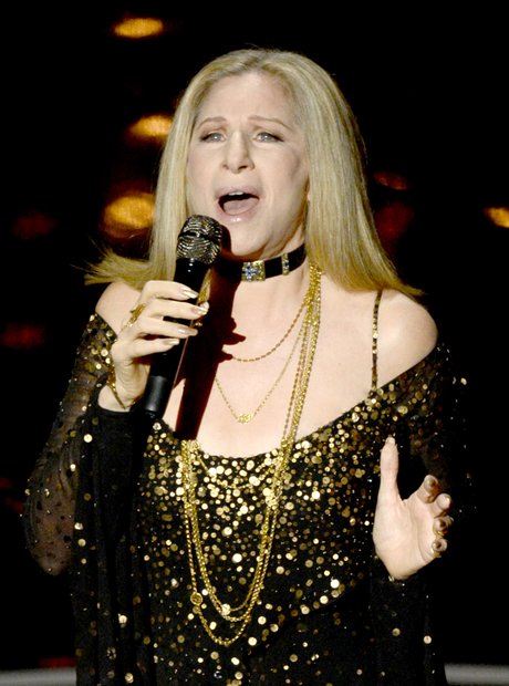Barbra Streisand performs on stage at the Oscars 2