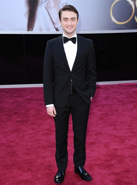 Daniel Radcliffe attends the Oscars 2013 red carpe