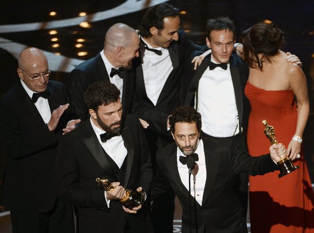 Grant Heslov and Ben Affleck on stage at the Oscar