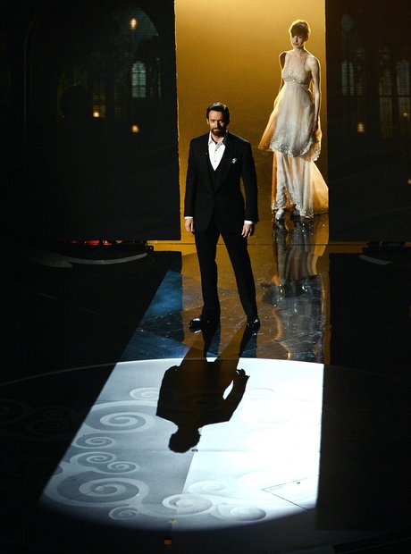 Hugh Jackman and Anne Hathaway on stage at the Osc