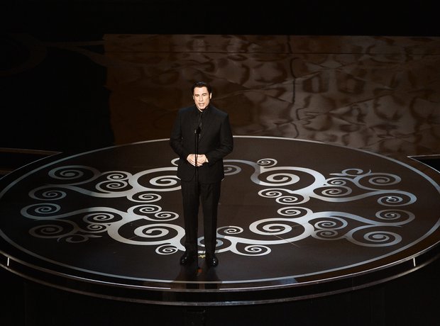 John Travolta presents at the Oscars 2013 awards s