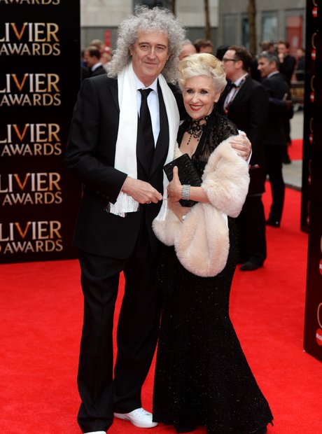 Brian May and Anita Dobson arrive at the Olivier Awards 2013