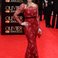Image 2: Idina Menzel arrives at the Olivier Awards 2013