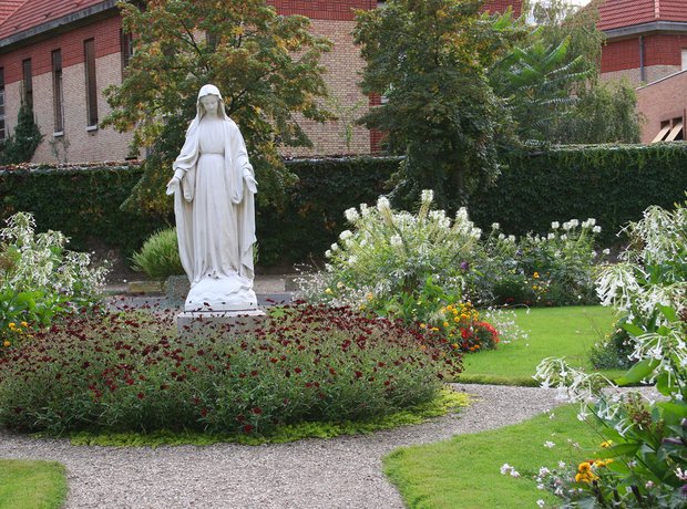 flowers and virgin mary