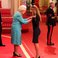 Image 7: Nicola Benedetti receives MBE Buckingham Palace