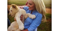 Katherine Jenkins and lion cub