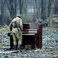 Image 4: Russian soldier playing Piano 1994
