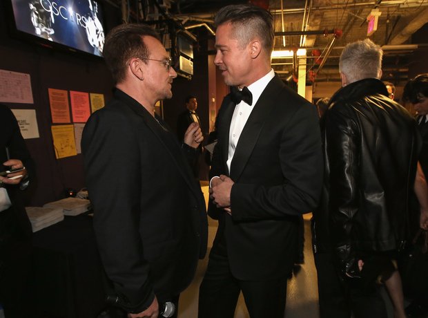 Bono of U2 and Brad Pitt Oscars 2014 backstage