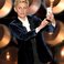 Image 1: Ellen DeGeneres at the Oscars 2014 on stage