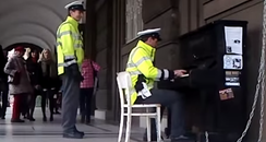 Policeman street piano