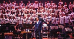 Russell Watson and the AC Academy choirs perform
