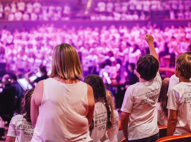 Russell Watson and the AC Academy choirs perform