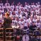 Image 4: Russell Watson and the AC Academy choirs perform