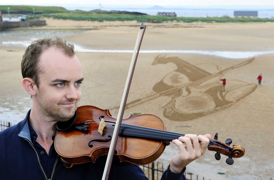Strad in the sand