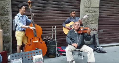 double bassist joins busking band