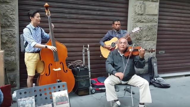 double bassist joins busking band