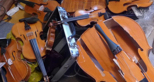 ex-wife smashed violins