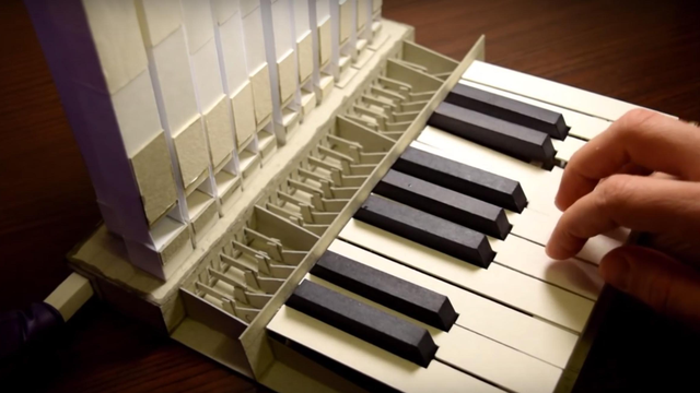 tiny pipe organ made of paper and cardboard