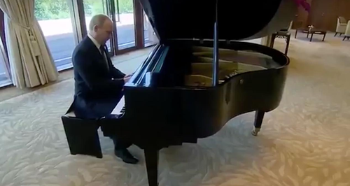 Putin plays the piano