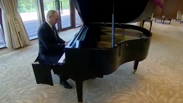 Putin plays the piano