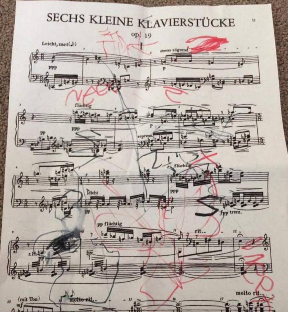 Red pen on sheet music