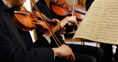 Why do orchestras have so many violins? - Classic FM